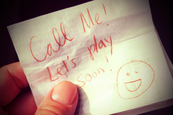 Image: A handwritten note that reads, "Call Me! Let's play soon!"