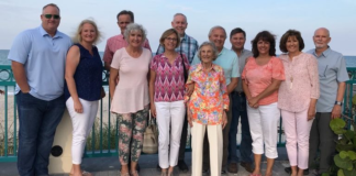 Image: Betty pictured with her children and their spouses