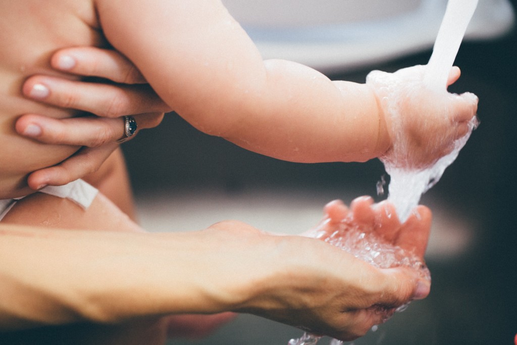 baby hand washing Clean Living: 6 Ways to Eliminate Toxins and Create a Healthier Home Bethany Pappas Contributor Miami Moms Blog