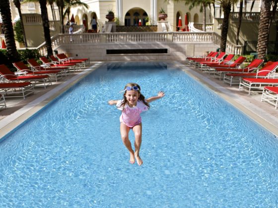 Girl-Jumping-Into-Pool 5 Unexpected Family-Friendly Luxury Hotels in Miami Ann Ueno Contributor Miami Moms Blog