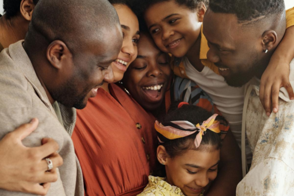 Image: A family enjoys a group hug