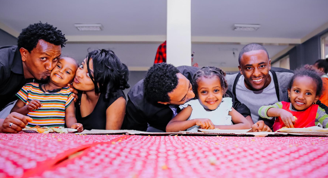 Image: Smiling family members at a family gathering