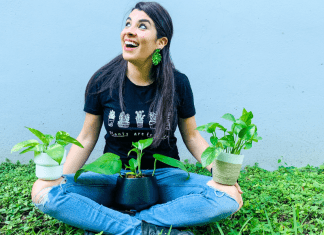 Image: Ana-Sofia holding a few species of pothos plants