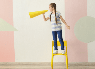 A young girl with a megaphone (Keeping Your Kid's Voice Healthy: Some Helpful Tips Cindy Herde Contributor Miami Mom Collective)