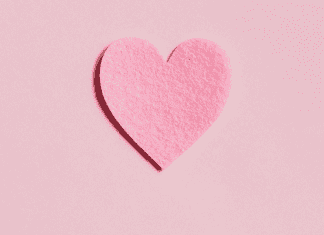 A pink paper heart (More Self-Love in 2021: 7 Ways to Love Ourselves Daily Rachelle Haime Contributor Miami Mom Collective)