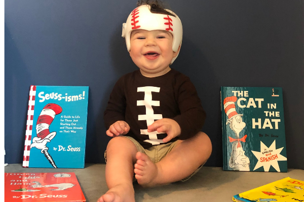 Jessica's son with a cranial helmet (Plagiocephaly and a Cranial Helmet: It's Not As Scary As It Looks Jessica Socarras Contributor Miami Mom Collective)