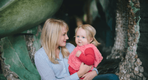 Image: A mother holding her toddler-aged daughter (Single Mom: Loving for Two Kristin Parke Contributor Miami Mom Collective)