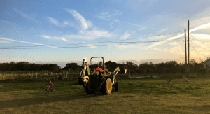 Kristina's husband on a tractor (Making Changes: Taking A Step Back In Order To Move Forward Kristina Fiorentino Contributor Miami Mom Collective)