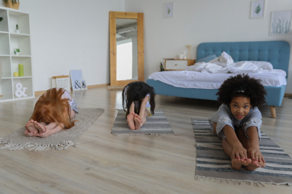 Kids doing yoga together (Jessica Alvarez-Ducos Contributor Miami Mom Collective)