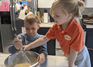Rachel's kids stirring waffle batter (International Waffle Day: Like Music to My Ears Rachel Hulsund Contributor Miami Mom Collective)