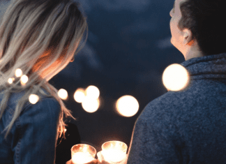 A couple sitting together (Dating Your Spouse: It's the Best Investment You'll Ever Make Rachel Hulsund Contributor Miami Mom Collective)