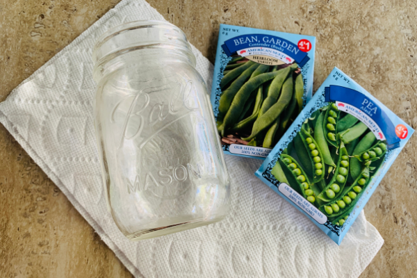 Image: Seed packets, a jar and a paper towel