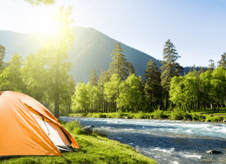 Tent camping in the mountains (Let’s Go Places! 5 Trips to Take Now Vanessa Santamaria Contributor Miami Mom Collective)