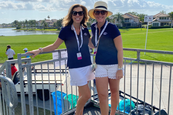 Michelel and one of her teammates (Michelle Boggs: A Miami Leader Invested in our Future Ann Keil Dux Contributor Miami Mom Collective)