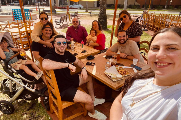Jacqueline and her friends at a local outdoor restaurant (Jacqueline Jebian Garcia Contributor Miami Mom Collective)