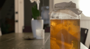A glass of kombucha (Kombucha 101: What It Is and How to Make It Kristina Fiorentino Contributor Miami Mom Collective)