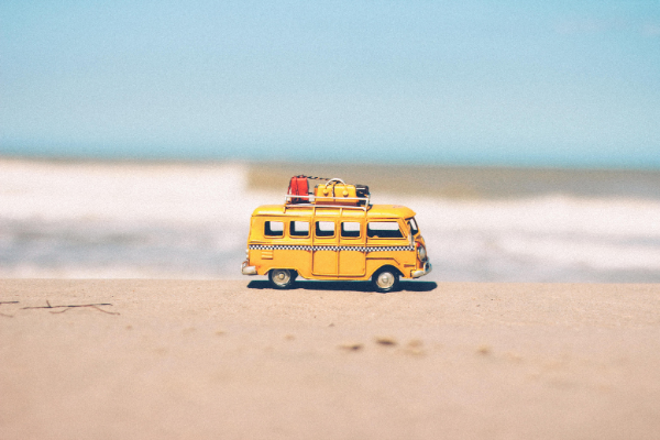 Image: A toy minibus on the beach