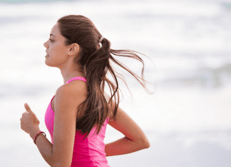 A woman running (Run Like A Mother: A Beginner's Guide to Running Kristen Llorca Contributor Miami Mom Collective)