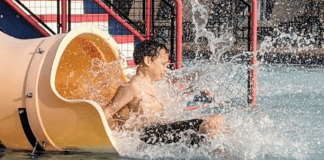 Going down a water slide (Summer Is Almost Here! Are You Ready? | Dr. Bob Pediatric Dentist Lynda Lantz Contributor Miami Mom Collective)