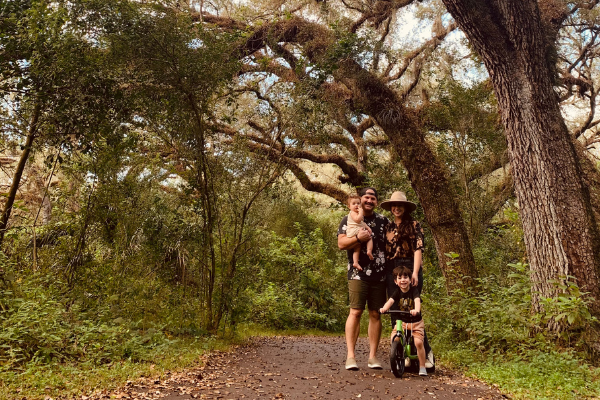 Jacqui with her husband and children (Managing Postpartum Feelings of Grief and Loss Jacqueline Jebian Garcia Contributor Miami Mom Collective)