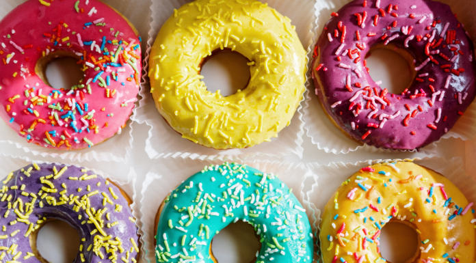 A box of donuts with sprinkles (National Donut Day: Make it A-Glaze-ing! Ana-Sofia DuLaney Contributor Miami Mom Collective)