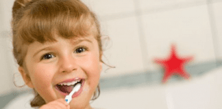 A little girl brushing her teeth (Dr. Bob Unflavored Toothpaste: Sustainable, Fluoridated Cavity Prevention Lynda Lantz Contributor Miami Mom Collective)