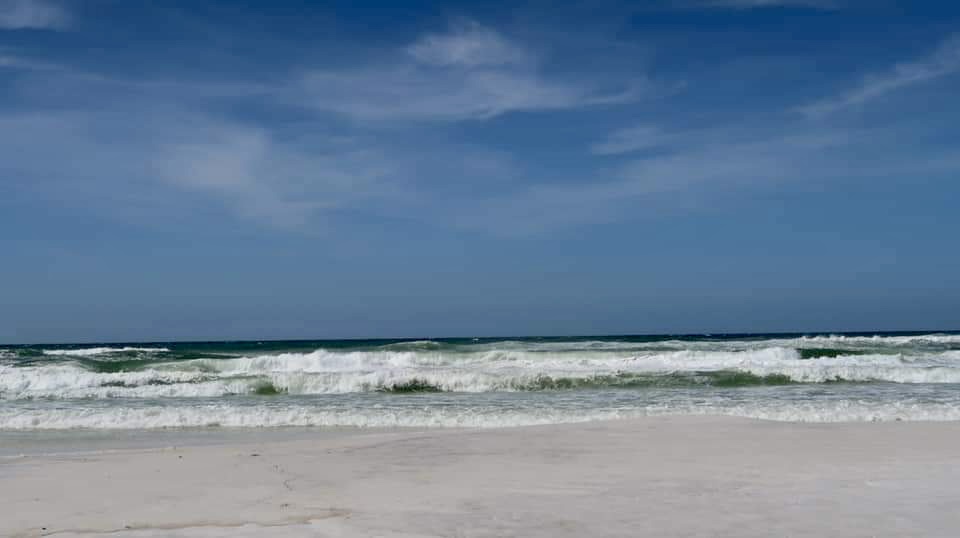 Image: A stormy sky over Destin Beach (Jessica Alvarez-Ducos Contributor Miami Mom Collective)