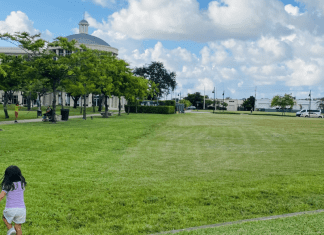 Valerie's daughter running in an open green space (Love Where You Live: Why I Love Living in Doral Valerie Barbosa Contributor Miami Mom Collective)