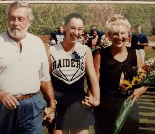 Sandra with her parents at a high school football game (Love Where You Live: Why I Love Living In Pinecrest Sandra Jacquemin Contributor Miami Mom Collective)