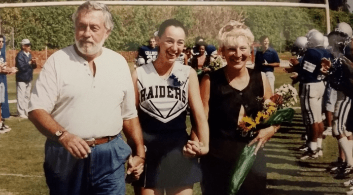 Sandra with her parents at a high school football game (Love Where You Live: Why I Love Living In Pinecrest Sandra Jacquemin Contributor Miami Mom Collective)