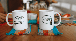 Image: A set of mugs that read, "I love you," "I know"