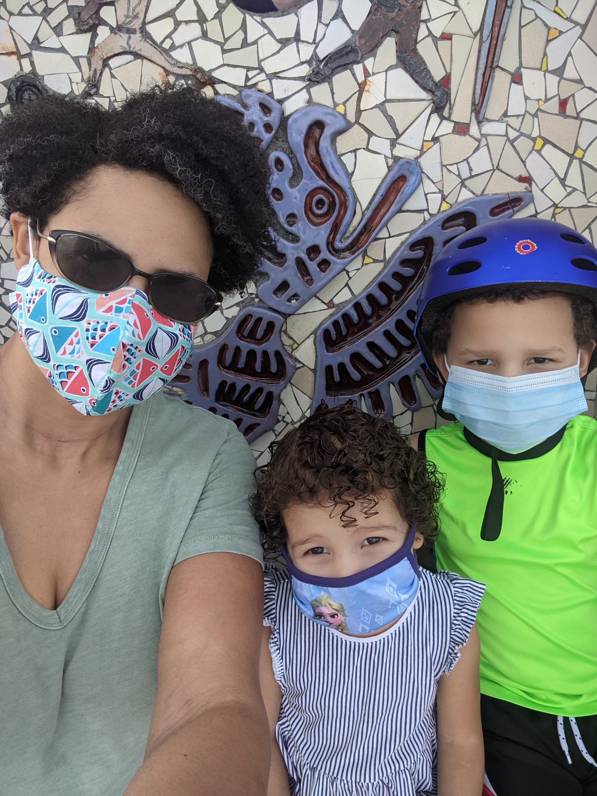 Lynda and her kids wearing their masks (Back to School: Helping Your Kids Succeed | Dr. Bob Pediatric Dentist Lynda Lantz Contributor Miami Mom Collective)