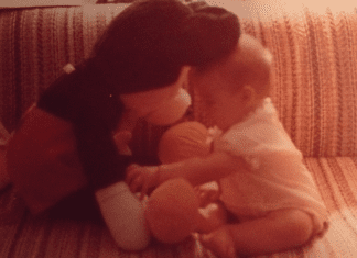 A picture of Sandra as an infant with her first Mickey toy (Disney Has Some Secrets, Sort Of Sandra Jacquemin Contributor Miami Mom Collective)