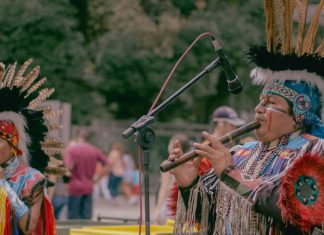 Image: Indigenous people playing traditional instruments