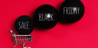 Image: A shopping cart and black balloons that read "Sale Black Friday" (Black Friday Deals: 5 Ways to Make the Most of Them Ana-Sofia DuLaney Contributor Miami Mom Collective)