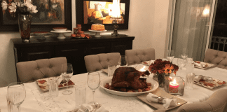 Image: A dining room table set for a Friendsgiving meal