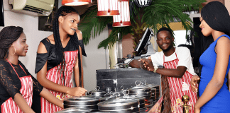 Image: A group of employees at a black-owned restaurant (Miami Eats and Treats: Support Local Black Owned Restaurants Dina Garcia Contributor Miami Mom Collective)