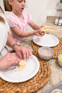 Image: Mother and daughter making a Resurrection Rolls together