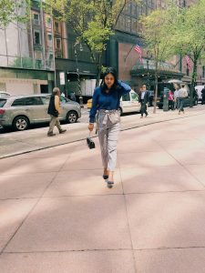 A woman walking to work in the city