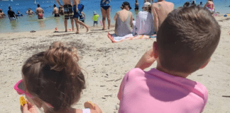 Summer DIY Fun: Creative Ideas to Keep Your Family Entertained Two kids enjoying a day at the beach