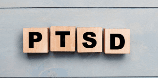Letter tiles spelling out PTSD