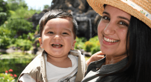 Daniella holding her 1-year old son