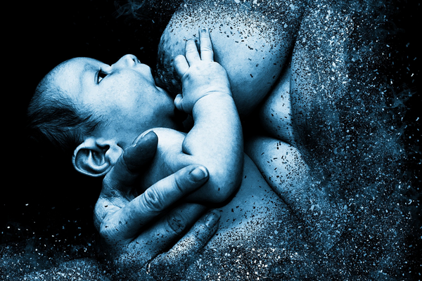 A mother breastfeeding her newborn baby