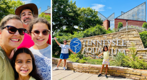 A family poses for pictures at the Tennessee Aquarium