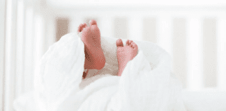 Going Nontoxic: Baby Edition! Baby feet sticking out from a blanket