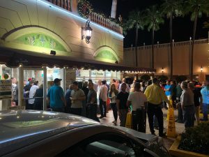 Image: A crowd of people gathered at Versailles in Little Havana