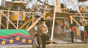 Jacqueline at a carnival with her children