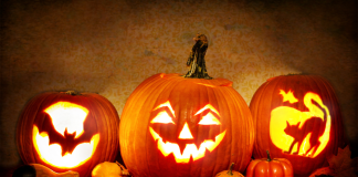 3 carved Halloween jack o' lanterns