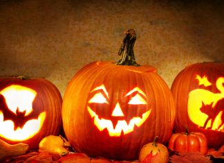 3 carved Halloween jack o' lanterns