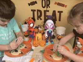 Decorating pumpkin cookies